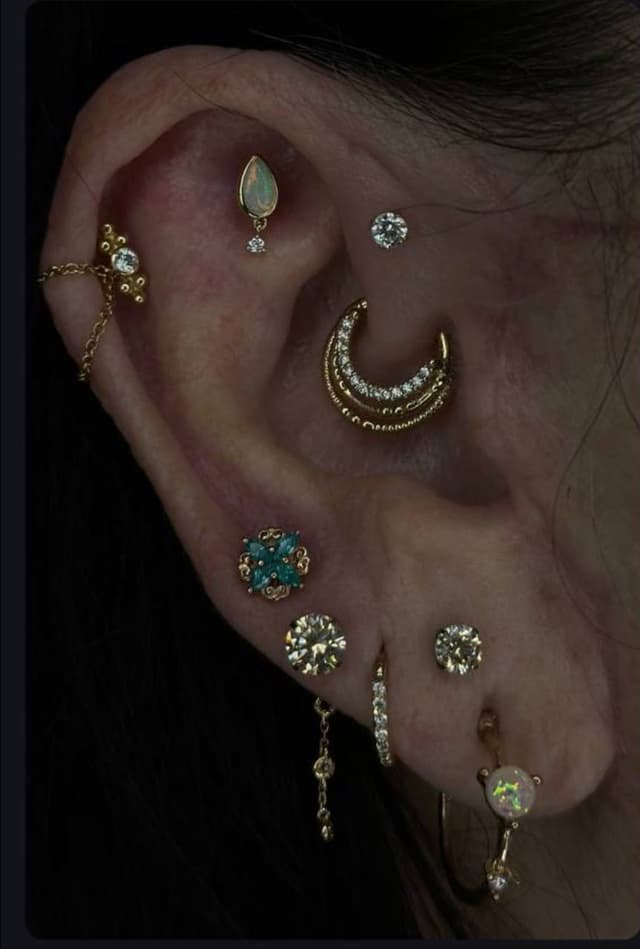 Curated ear piercing on the ear by Noah at Platinum Tattoos & Piercings, San Antonio TX