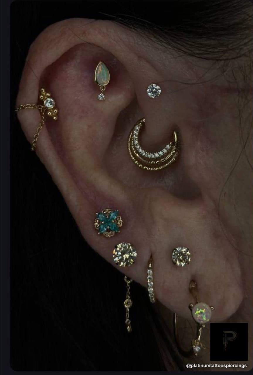 Curated ear piercing on the ear by Noah at Platinum Tattoos & Piercings, San Antonio TX