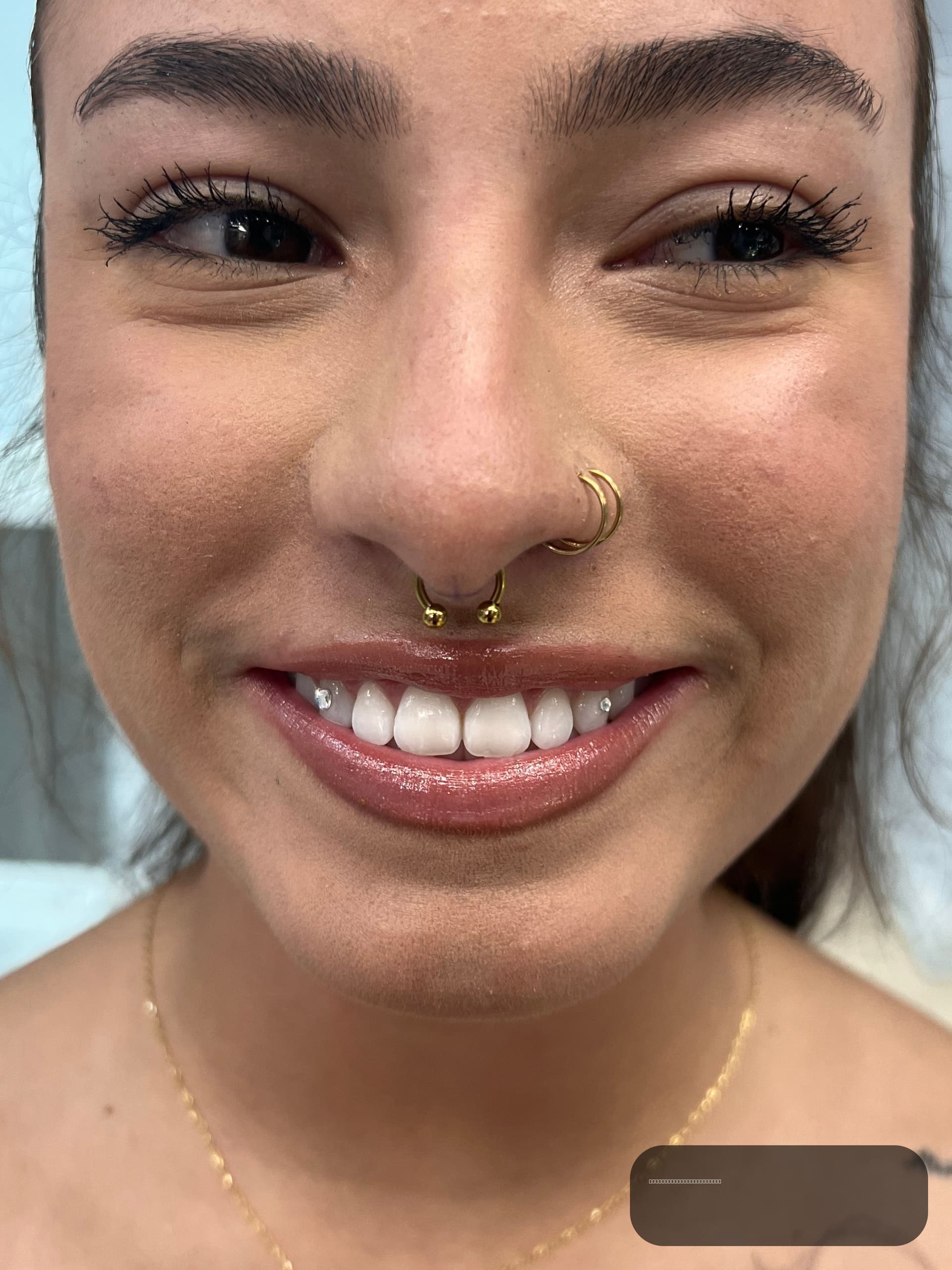 Septum piercing with Implant Grade Titanium Circular Barbell by JC at Platinum Tattoos & Piercings, San Antonio TX