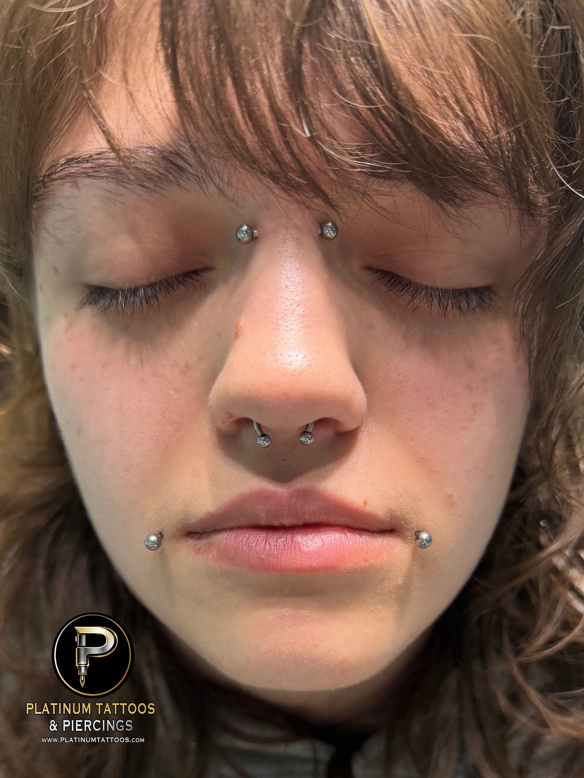 Circular Barbell, Barbell, Labret Stud/Flat Back piercing on the Septum, Bridge, Dahlia by Mingo at Platinum Tattoos & Piercings, San Antonio TX
