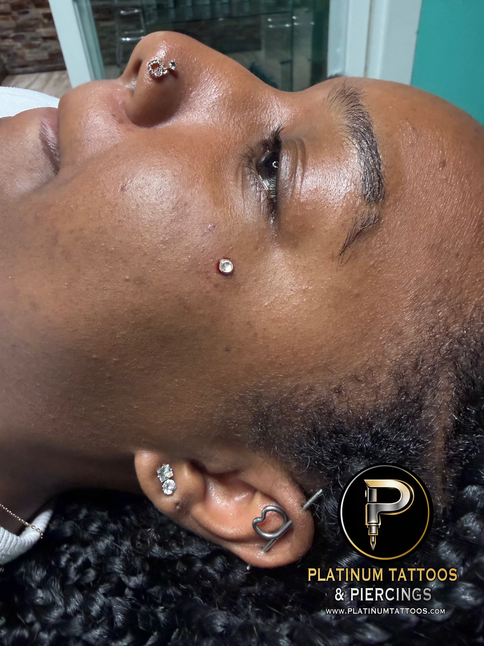 Surface Jewelry piercing on the Dermal by Mingo at Platinum Tattoos & Piercings, San Antonio TX