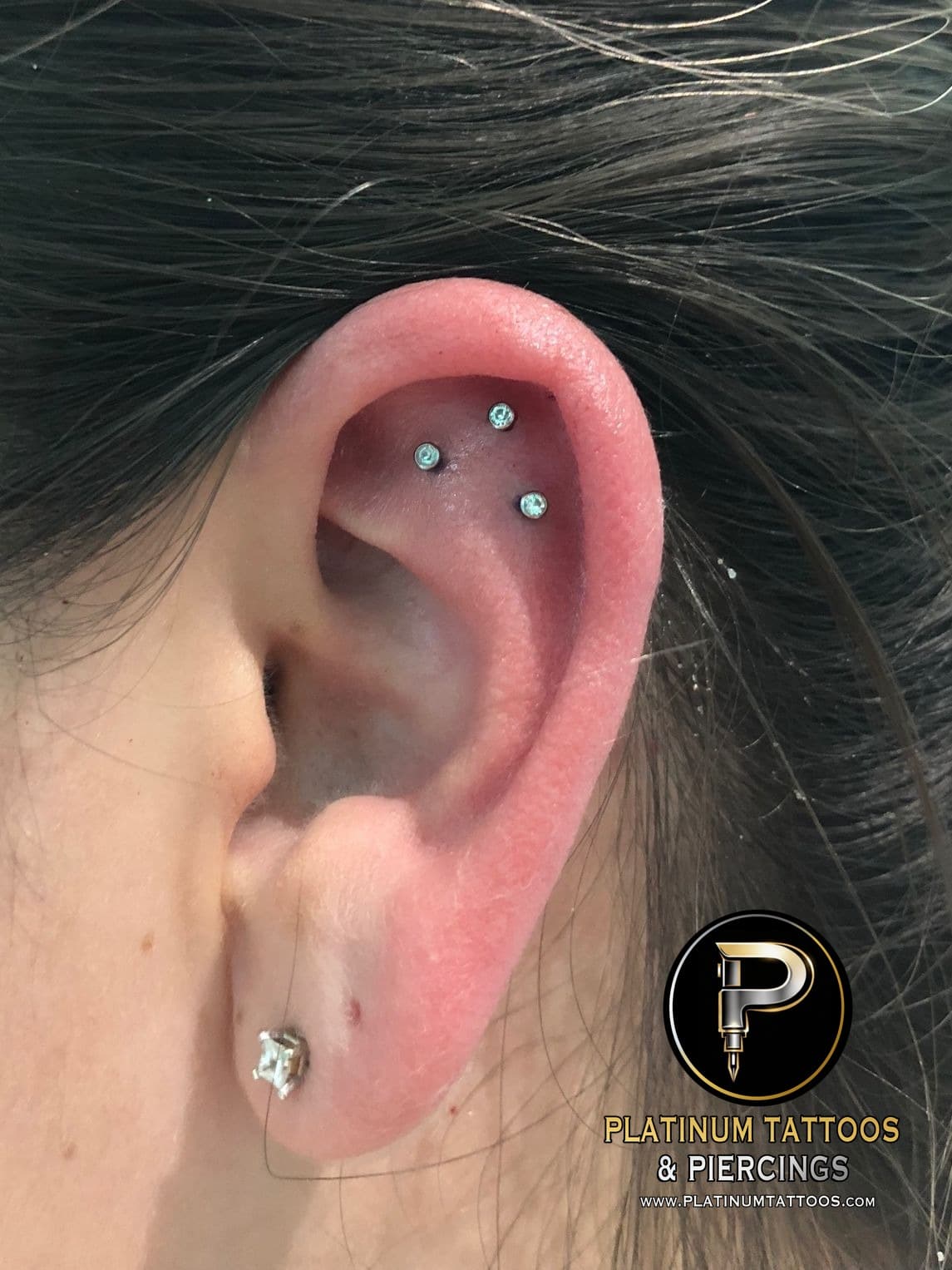 piercing 3rd Helix on the Right Ear by Mingo at Platinum Tattoos & Piercings, San Antonio TX