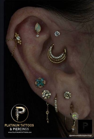 Curated ear piercing on the ear by Noah at Platinum Tattoos & Piercings, San Antonio TX