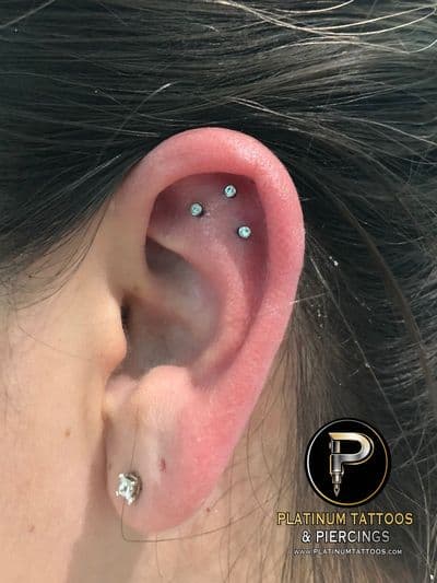 piercing 3rd Helix on the Right Ear by Mingo at Platinum Tattoos & Piercings, San Antonio TX