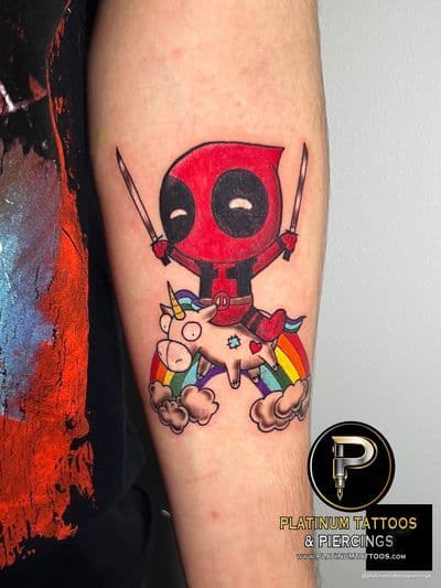 Anime tattoo on the forearm by Jesus at Platinum Tattoos & Piercings, San Antonio TX