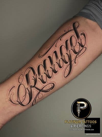 Lettering tattoo on the forearm by Remy at Platinum Tattoos & Piercings, San Antonio TX
