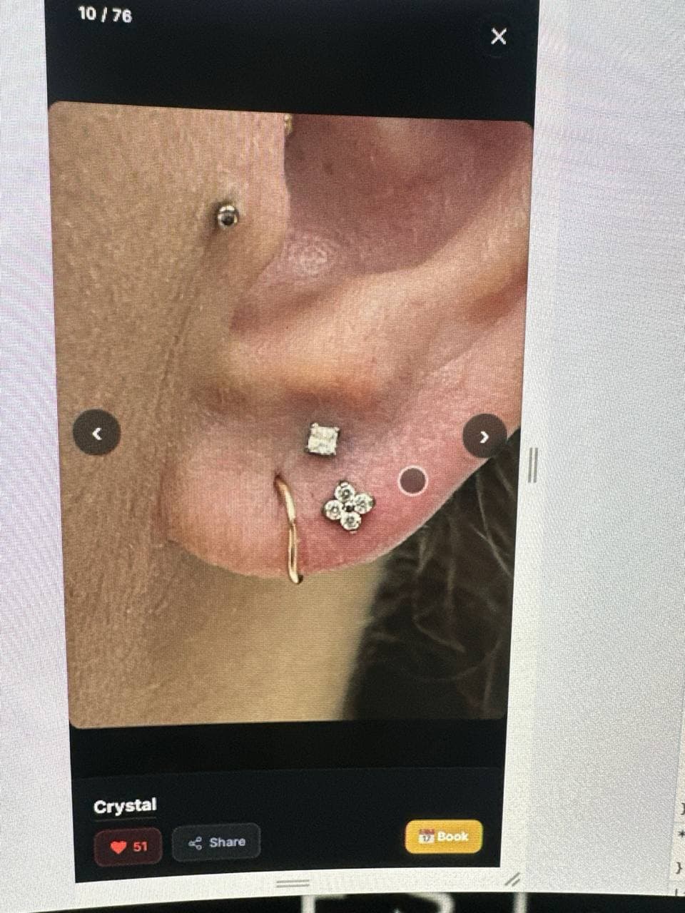 Curated ear piercing with solid gold ring and flower stud — Platinum Tattoos & Piercings San Antonio